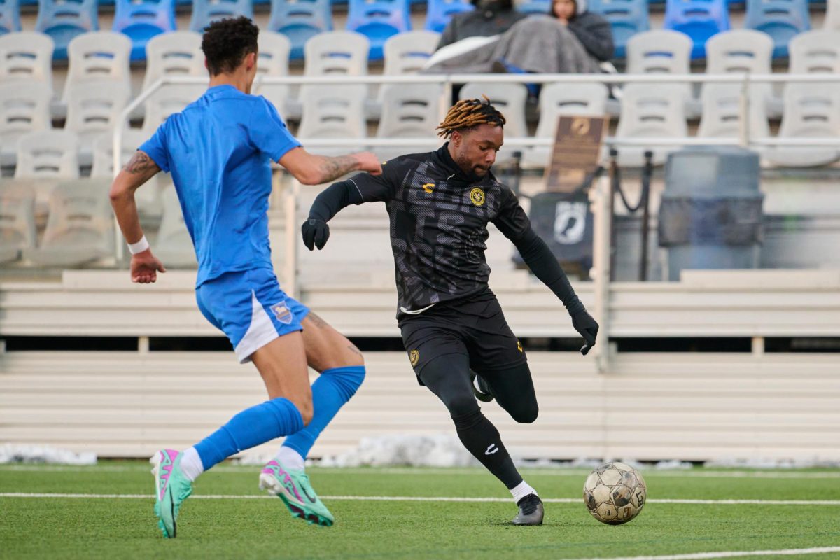 A Riverhounds player kicks the ball during Saturday evening鈥檚 game against the Pittsburgh Riverhounds at Highmark Stadium.